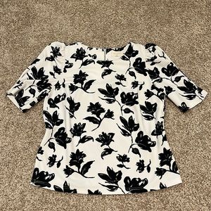 White blouse with black flowers